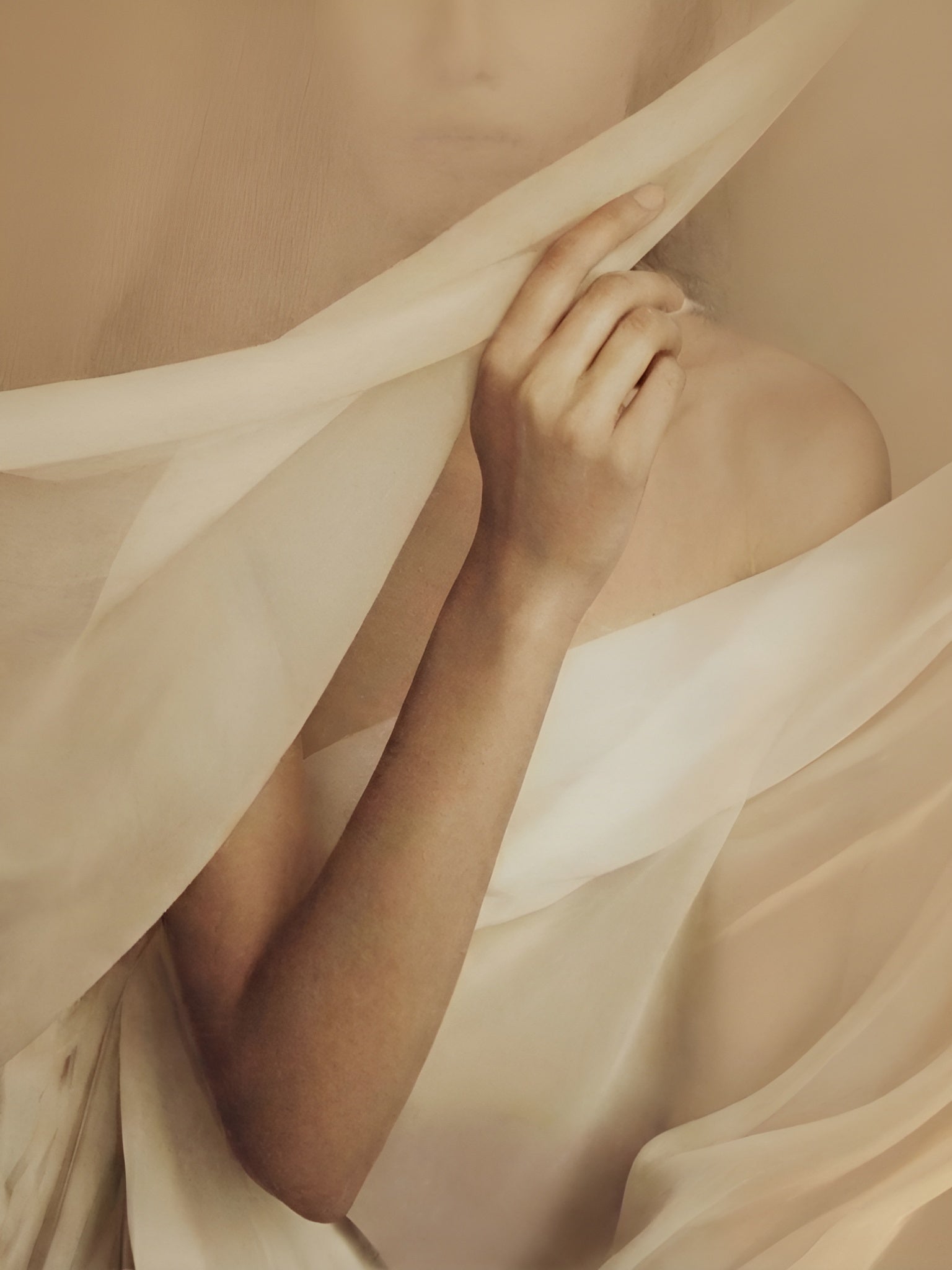 Soft editorial image symbolizing ritual, touch, and intentional body care by About Eve